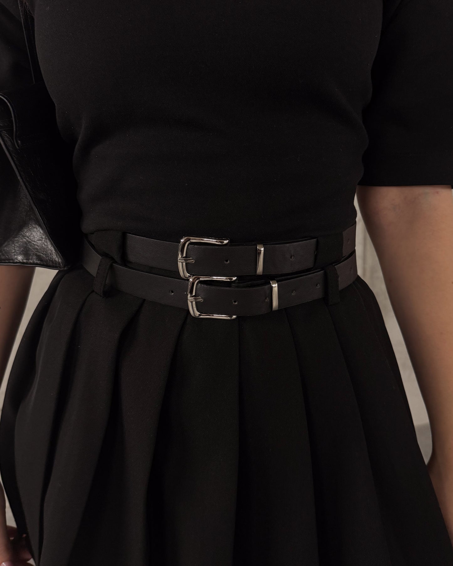 Aukšto liemens klostuotas sijonas